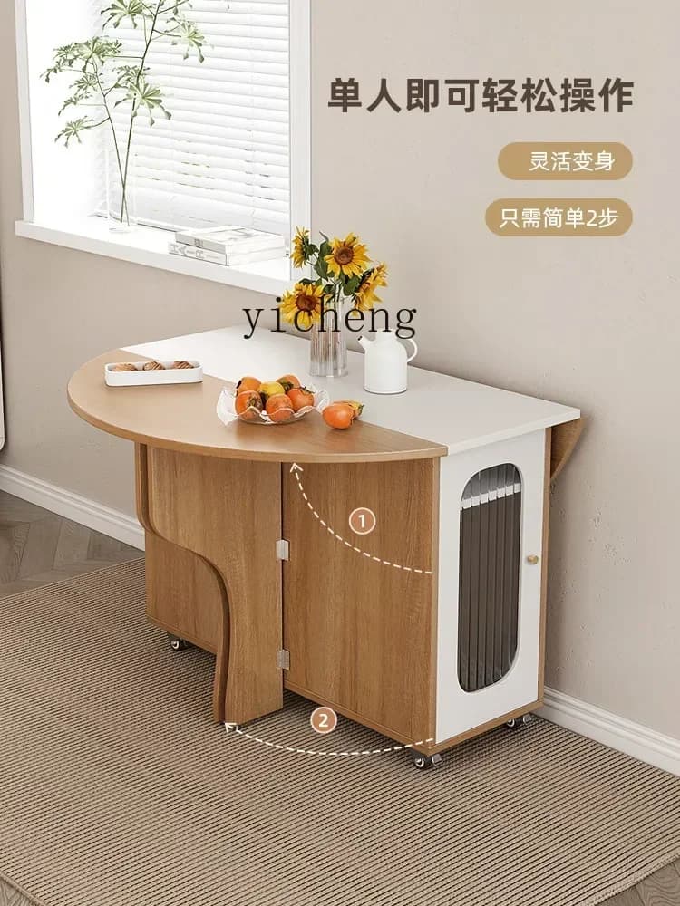 Modern wood-grain folding round dining table with internal storage compartment and mobile wheels.