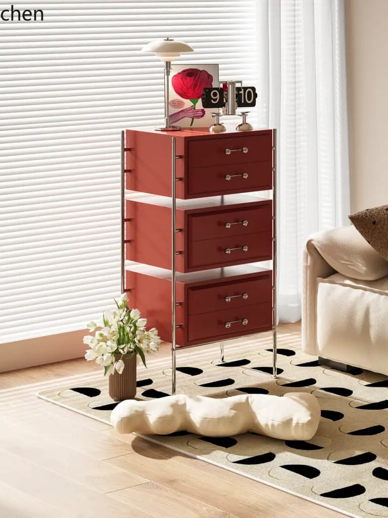 Red modern solid wood storage cabinet with three tiered drawers and a chrome metal frame.